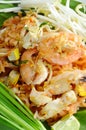 Pad Thai stir fried rice noodles with shrimp and squid on plate Royalty Free Stock Photo