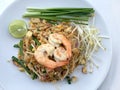 Pad Thai, stir-fried rice noodles with shrimp in white dish on white background. The one of Thailand's national main dish. th Royalty Free Stock Photo