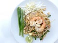 Pad Thai, stir-fried rice noodles with shrimp in white dish on white background. The one of Thailand's national main dish. th Royalty Free Stock Photo