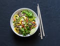 Pad Thai vegetables soba noodles on dark background, top view. Healthy vegetarian food Royalty Free Stock Photo