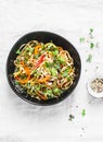 Pad Thai vegetarian vegetables udon noodles in a light background, top view. Vegetarian food Royalty Free Stock Photo