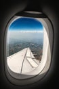 Padan Plain seen Through the Porthole Window with Airplane Wing Royalty Free Stock Photo