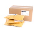 Padded envelopes and cardboard parcel Royalty Free Stock Photo