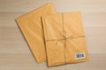 Padded envelopes on wood, flat lay