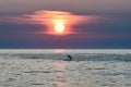 Paddle Boarder Under A Rising Sun on Lake Michigan #1