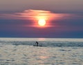 Paddle Boarder Under A Rising Sun on Lake Michigan 3