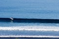 Paddle boarding in the surf