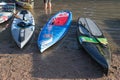 Paddle boards with very different paint jobs Royalty Free Stock Photo