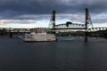 Paddle Boat leaving bridge Royalty Free Stock Photo