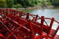 Paddle boat wheel spinning in the water Royalty Free Stock Photo