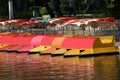 Paddle boats with canopies in a lake. Pedalos Royalty Free Stock Photo