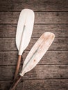 Paddle for canoe or kayak boat on wooden floor. Royalty Free Stock Photo