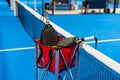 Paddle objects on blue court