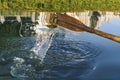 Paddle rowing on the water