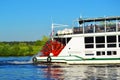 Paddle steamer powered by a steam engine that drives the paddle wheels to propel the ship through the water