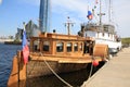 Paddle steamer and two-masted schooner at the pier on a sunny day Royalty Free Stock Photo