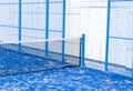 Paddle tennis and tennis net on blue court. Tennis competion concept. Horizontal sport poster, greeting cards, headers, website