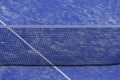 Paddle tennis net and blue court field background. Close up Royalty Free Stock Photo