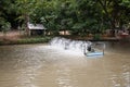 Paddle wheel aerator aquaculture. Royalty Free Stock Photo