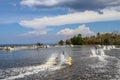 The paddle wheels on the floats oxygenate the water in the fish and shrimp tank. Water splashes into the air from spinning plastic Royalty Free Stock Photo