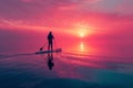 Paddleboarder on a calm lake at dawn Royalty Free Stock Photo