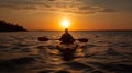 Paddling into the Sunset: Kayaker Silhouette on the Horizon. Royalty Free Stock Photo