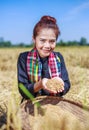 Paddy rice in farmer woman hand