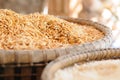 Paddy rice and rice in bamboo basket Royalty Free Stock Photo