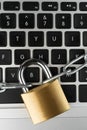 Padlock with chain on a laptop computer keyboard Royalty Free Stock Photo