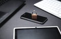 Padlock with computer keyboard, laptop, smartphone and tablet. Internet and technology security Royalty Free Stock Photo