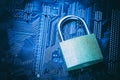 Padlock on computer motherboard. Internet data privacy information security concept