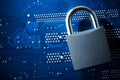 Padlock on computer motherboard. Internet data privacy information security concept. Antivirus and malware multilayer defense