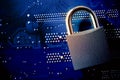 Padlock on computer motherboard. Internet data privacy information security concept. Antivirus and malware multilayer defense