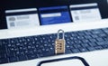 Padlock and credit cards on the computer keyboard. Credit card security Royalty Free Stock Photo