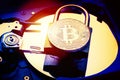 Padlock with cryptocurrency bitcoin on computer hard disk drive HDD. Internet data privacy information security concept. Electroni