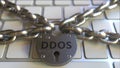 Padlock with DDOS text on the computer keyboard. Blocking or restriction related 3D rendering