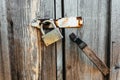 Padlock on the doors of an old abandoned barn Royalty Free Stock Photo