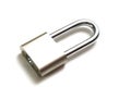 A padlock with elongated hook latch bar against a white backdrop Royalty Free Stock Photo