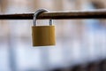 Padlock hangs on a bridge Royalty Free Stock Photo
