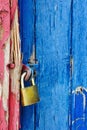 Padlock on highly textured door Royalty Free Stock Photo