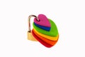 A padlock joins hearts with the colors of the LGBTI flag as a concept of a united community