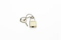 Padlock and key for bag or suitcase on white background Royalty Free Stock Photo