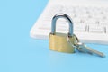 Padlock, keys and laptop keyboard. Cyber security concept Royalty Free Stock Photo