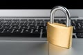 Padlock on a laptop computer keyboard Royalty Free Stock Photo