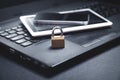 Padlock with laptop, smartphone and tablet. Internet and technology security Royalty Free Stock Photo