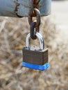 Padlock locked onto a heavy galvanized chain Royalty Free Stock Photo