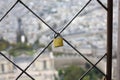 padlock of lovers hanging on the Eiffel tower