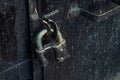 Padlock on an old iron black door Royalty Free Stock Photo