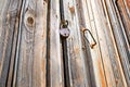 Padlock on old wooden doors Royalty Free Stock Photo