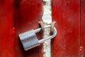 padlock on a red wooden door at a fire station Royalty Free Stock Photo